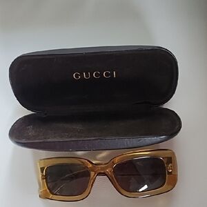 Gucci Women's Sunglasses with Gold Frame